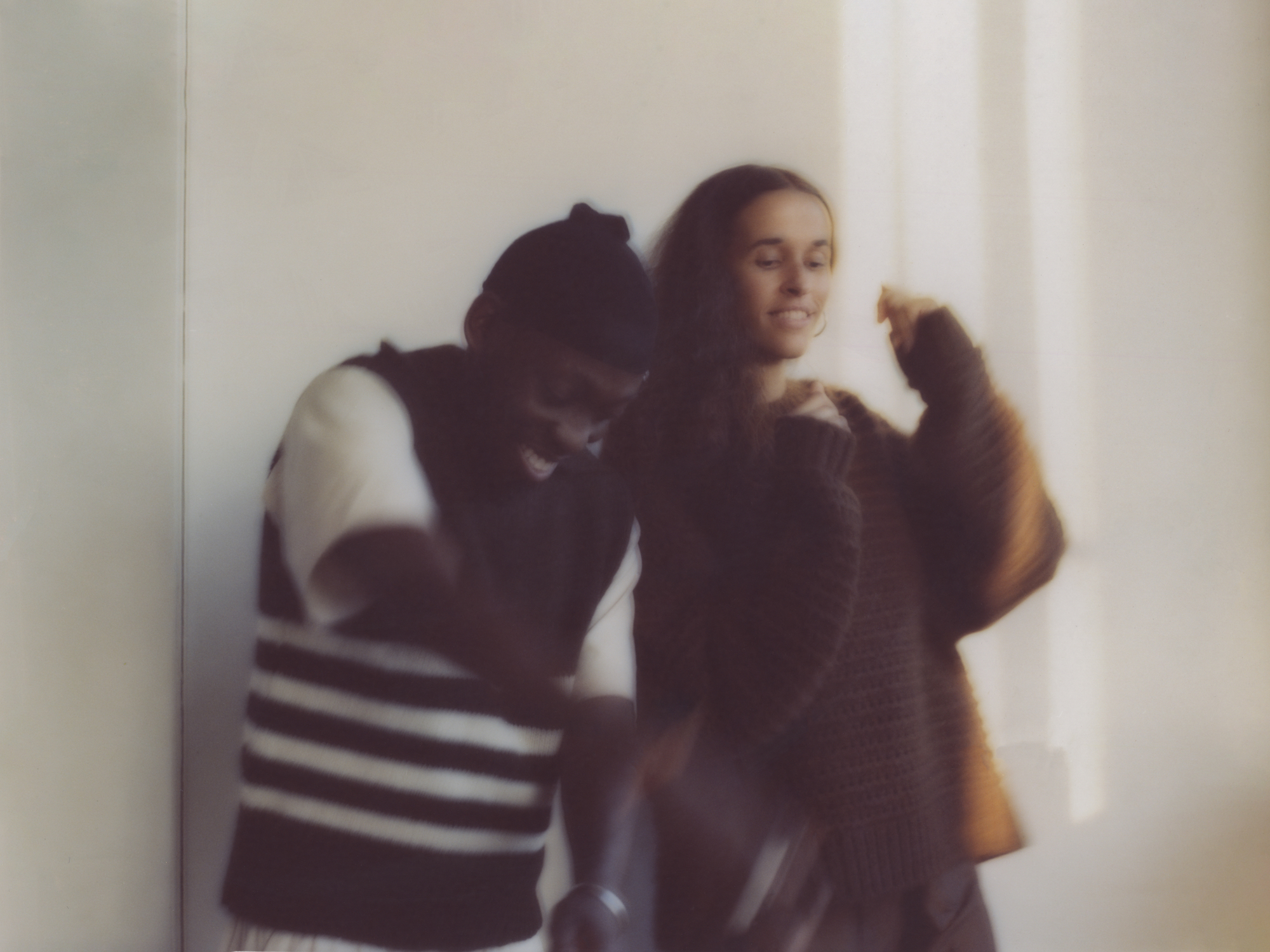 A blurry photo of Touching Bass founders Errol and Alex Rita